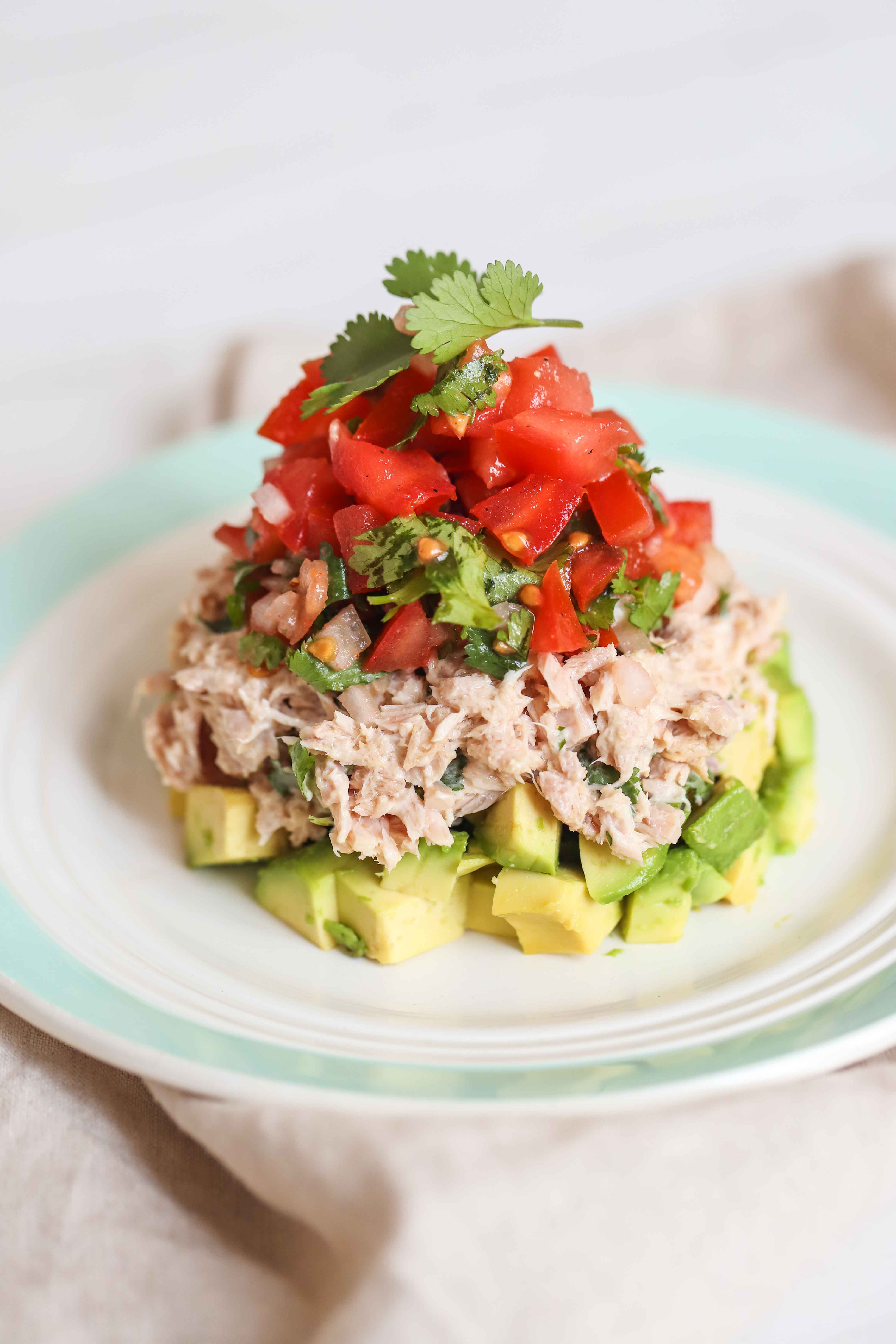 Avocado and tuna layered salad...full of healthy fats and protein, sure to keep you feeling full all afternoon.